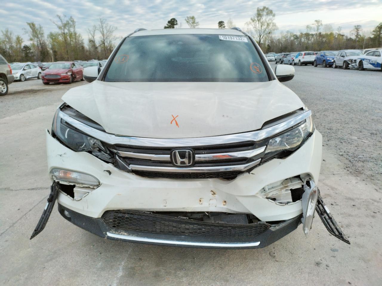 Photo 9 from auction – 2018 HONDA PILOT ELIT with VIN 5FNYF6H04JB041131