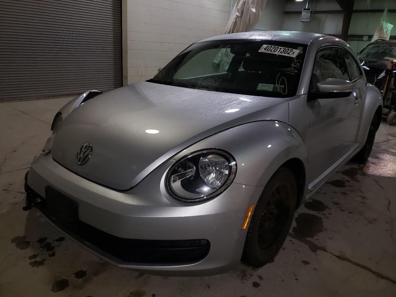 Photo 2 from auction – 2012 VOLKSWAGEN BEETLE with VIN 3VWJP7AT9CM618756