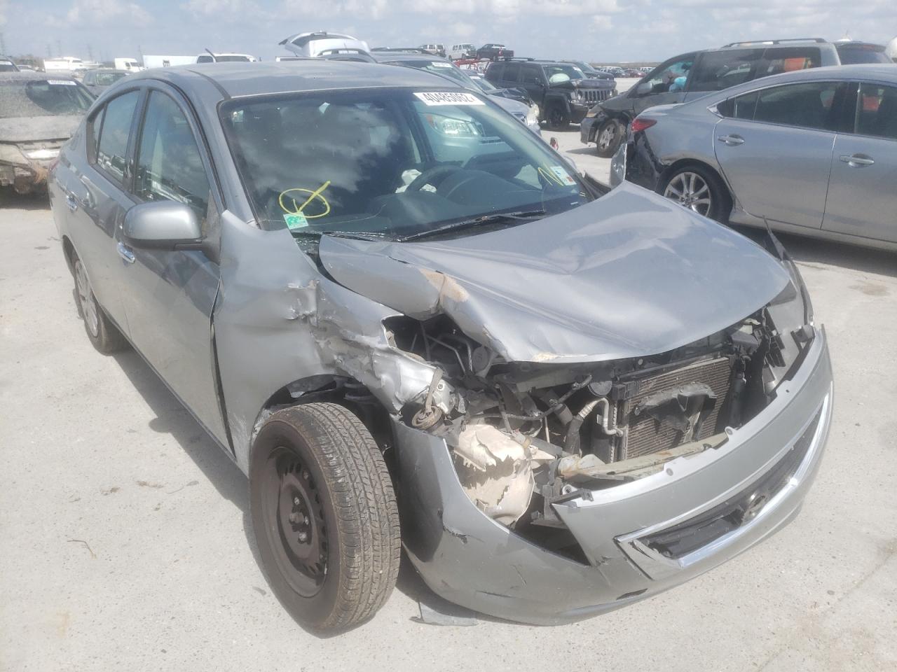 NISSAN VERSA S 2014 with VIN 3N1CN7AP9EL871043 - Photo from auction