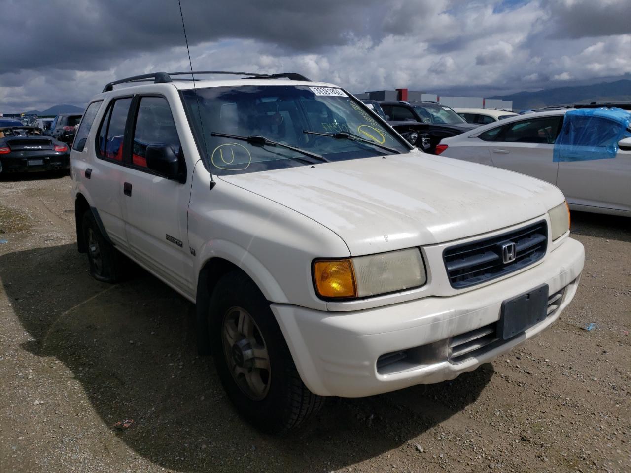 HONDA PASSPORT E 1999 with VIN 4S6CM58W5X4401606 - Photo from auction