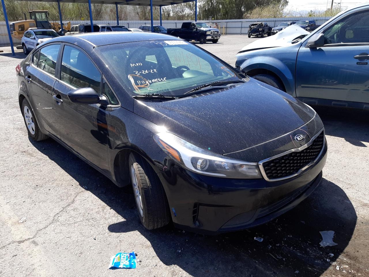 KIA FORTE LX 2017 with VIN 3KPFK4A7XHE034859 - Photo from auction