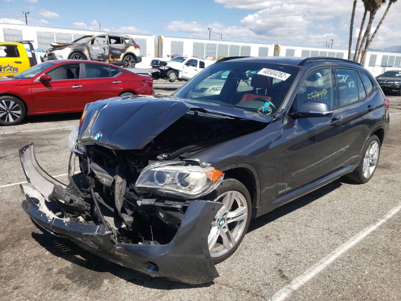 Photo 2 from auction – 2015 BMW X1 SDRIVE2 with VIN WBAVM1C58FVW58214