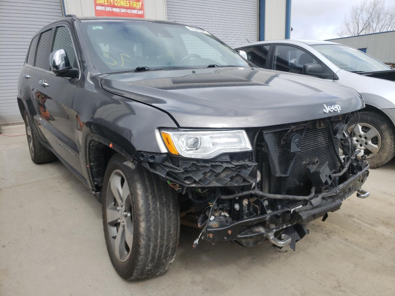 JEEP GRAND CHER 2015 with VIN 1C4RJFCG4FC708842 - Photo from auction