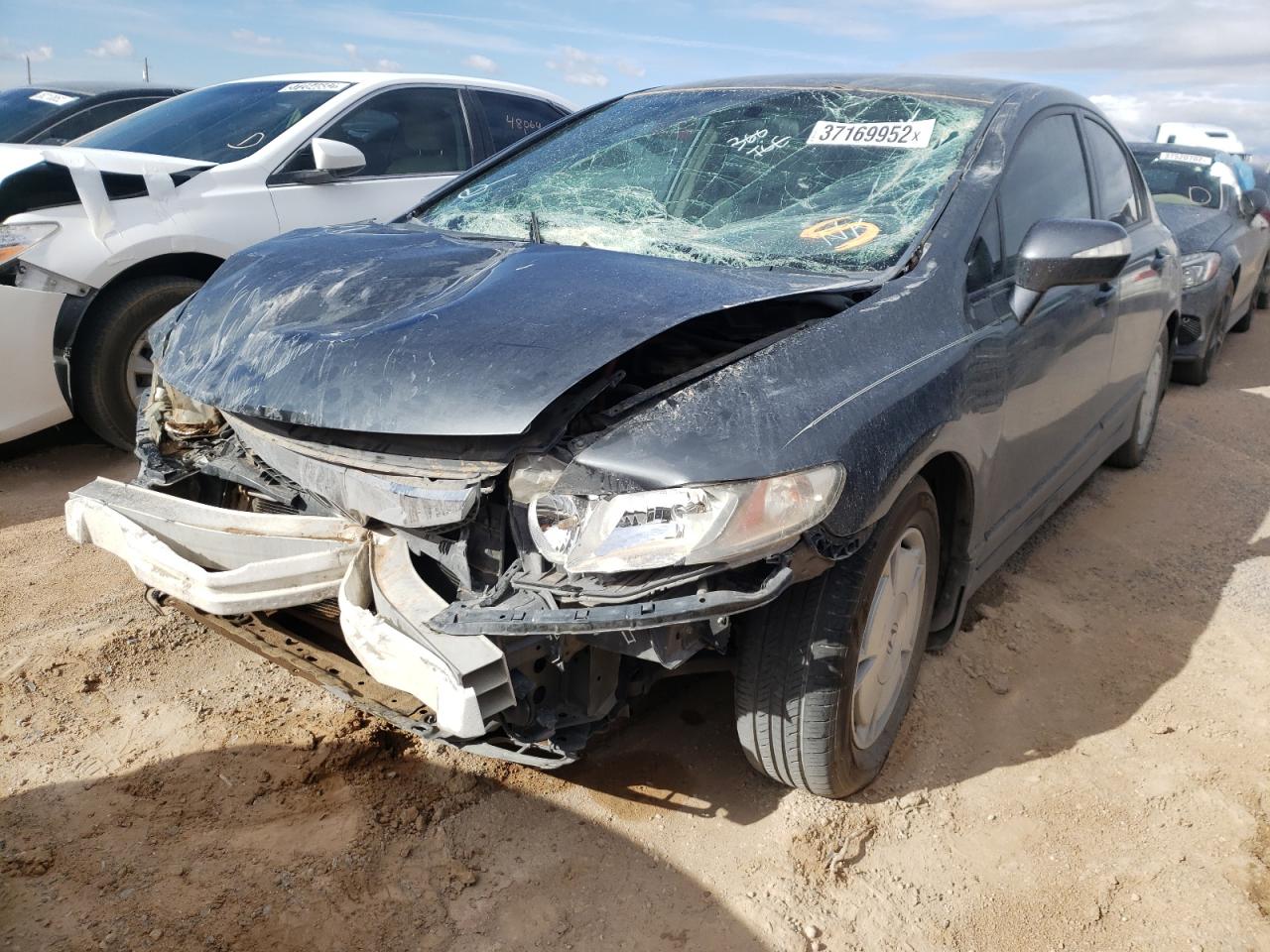 Photo 2 from auction – 2010 HONDA CIVIC HYBR with VIN JHMFA3F26AS004432