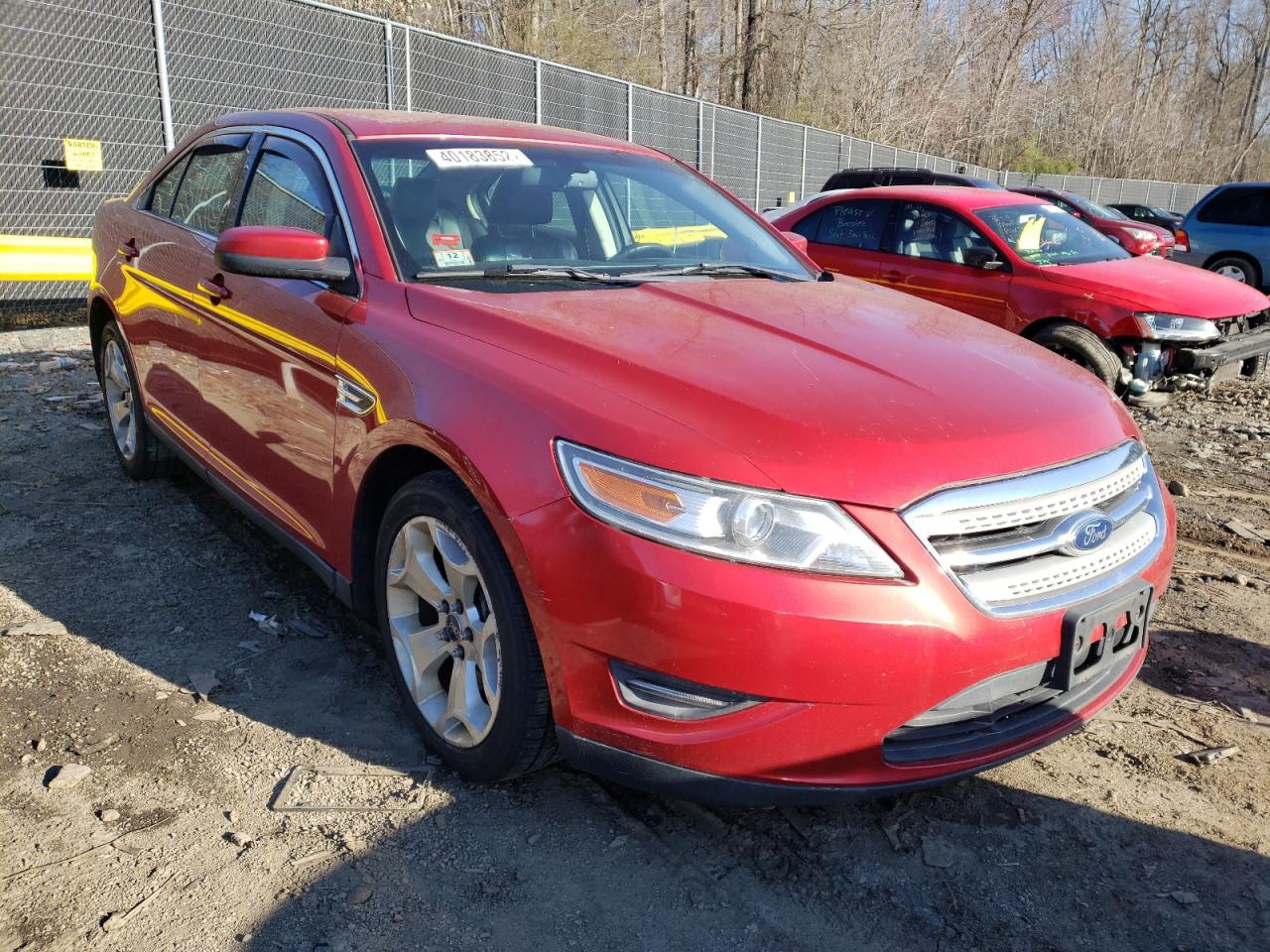 FORD TAURUS SEL 2011 with VIN 1FAHP2EW5BG173584 - Photo from auction