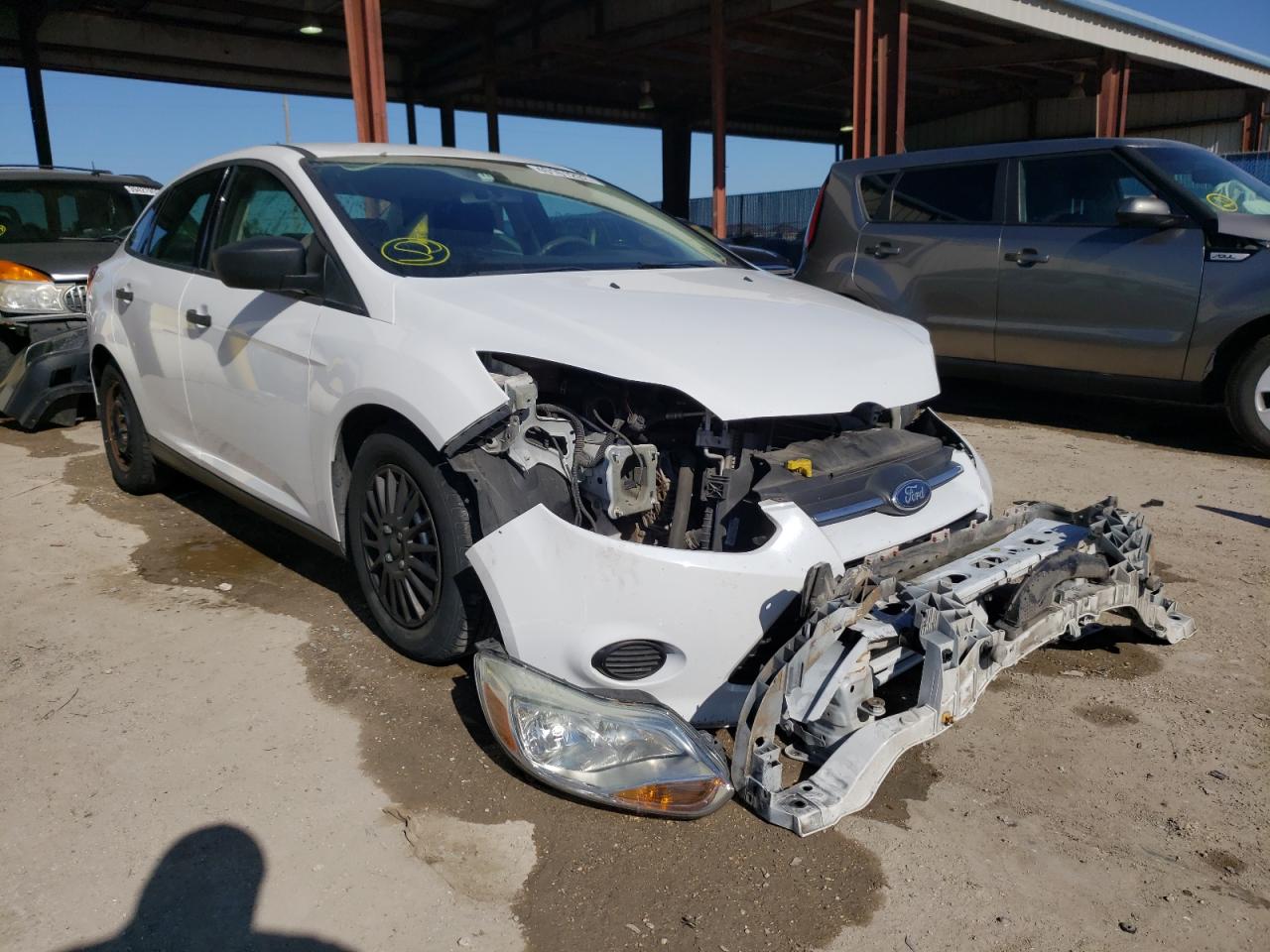 FORD FOCUS S 2013 with VIN 1FADP3E23DL352315 - Photo from auction