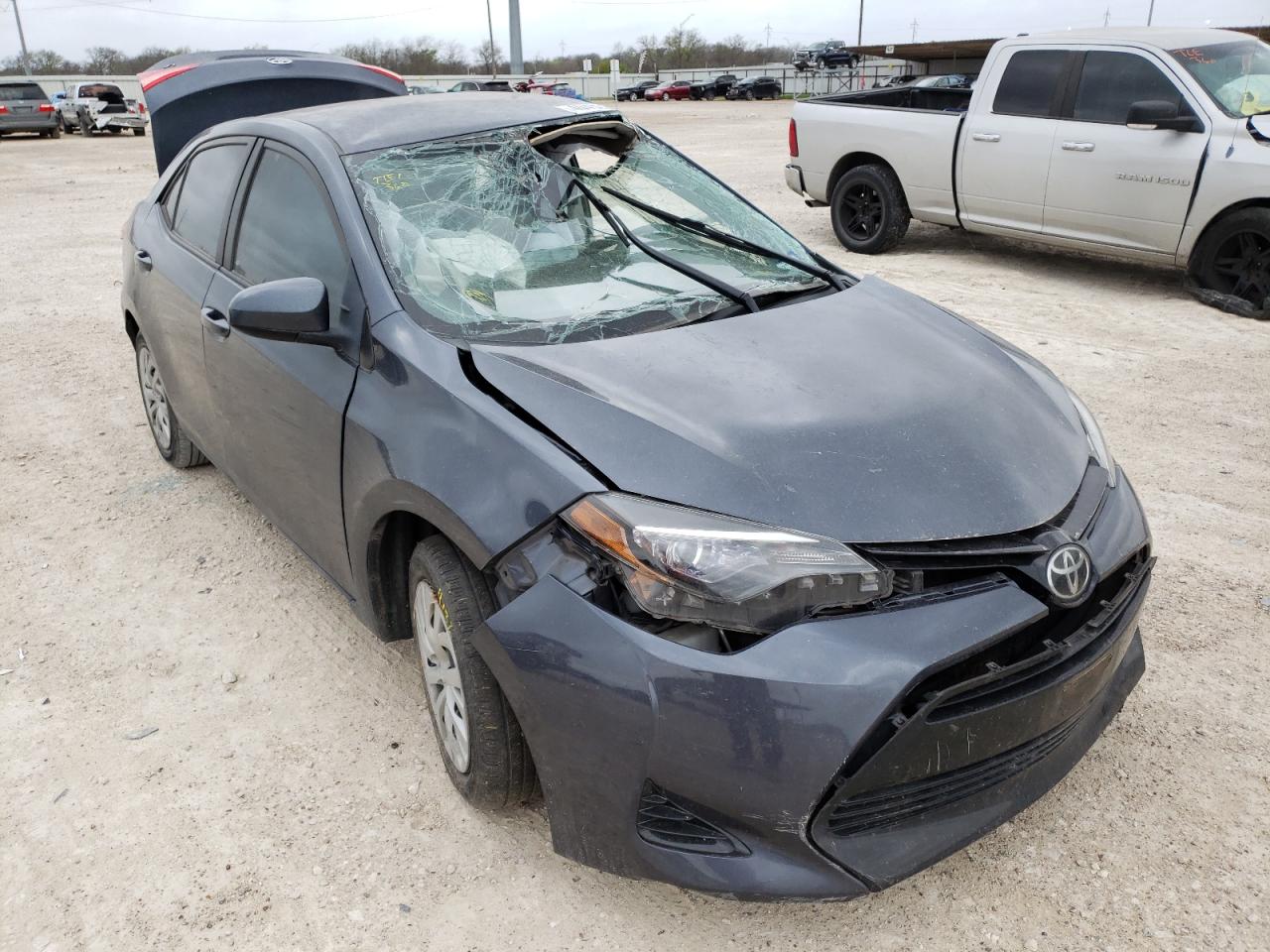 TOYOTA COROLLA L 2017 with VIN 5YFBURHE3HP676526 - Photo from auction