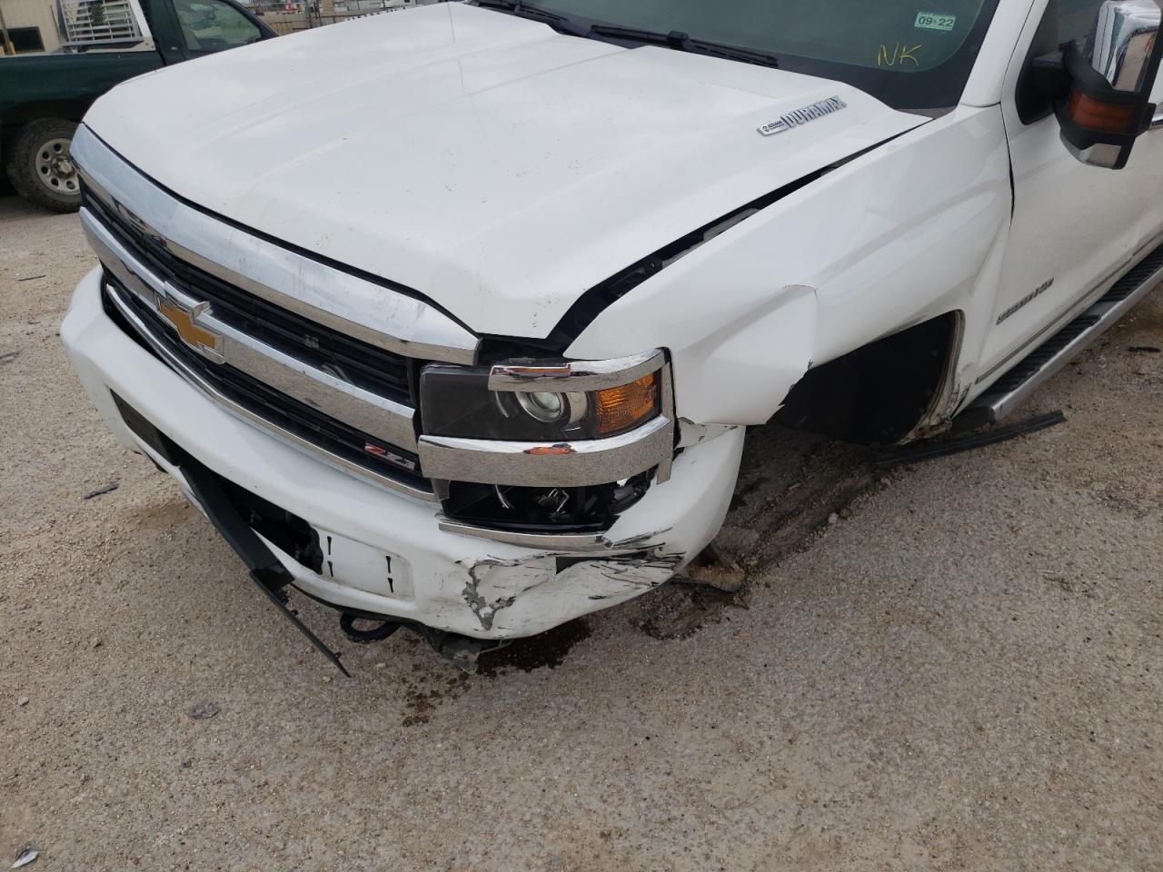 Photo 9 from auction – 2015 CHEVROLET SILVERADO with VIN 1GC1KWE84FF657809