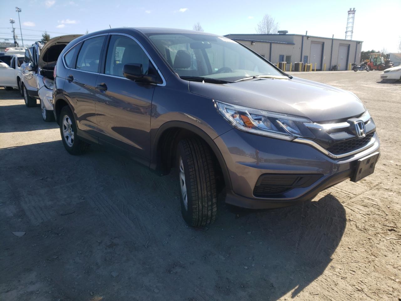 HONDA CR-V LX 2015 with VIN 3CZRM3H34FG702543 - Photo from auction