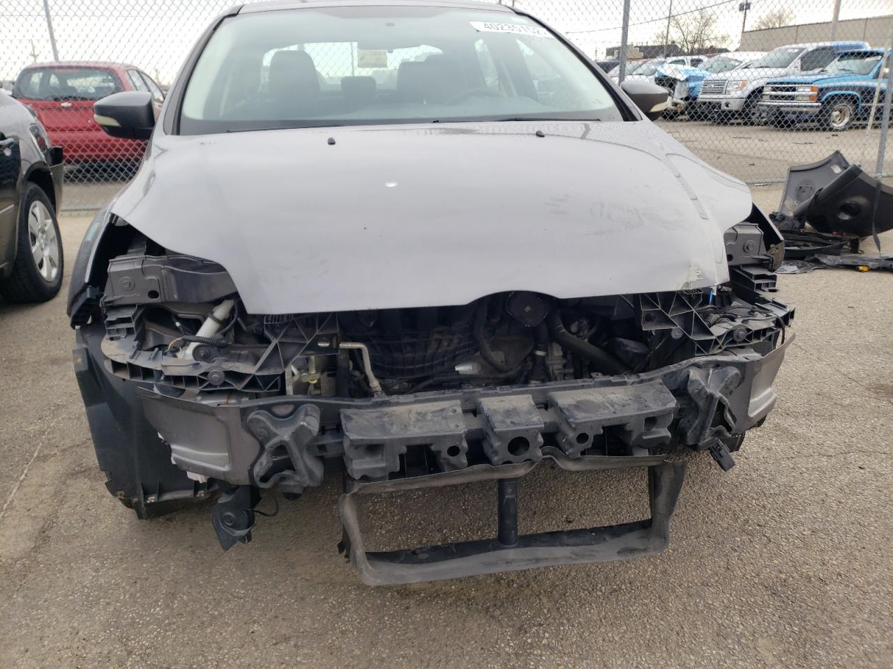 Photo 9 from auction – 2013 FORD FOCUS SE with VIN 1FADP3F29DL176143