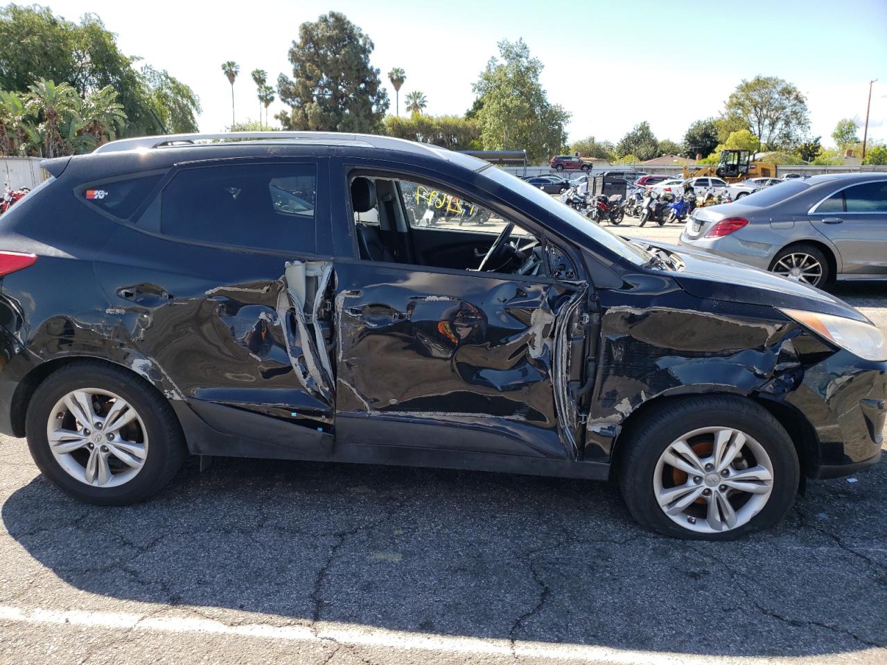 Photo 9 from auction – 2011 HYUNDAI TUCSON GLS with VIN KM8JU3AC2BU229936
