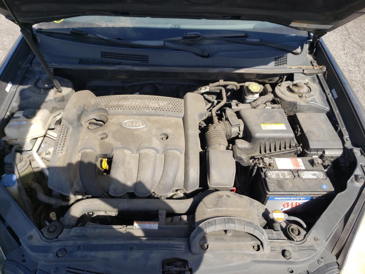 Photo 7 from auction – 2007 KIA OPTIMA LX with VIN KNAGE123775137461