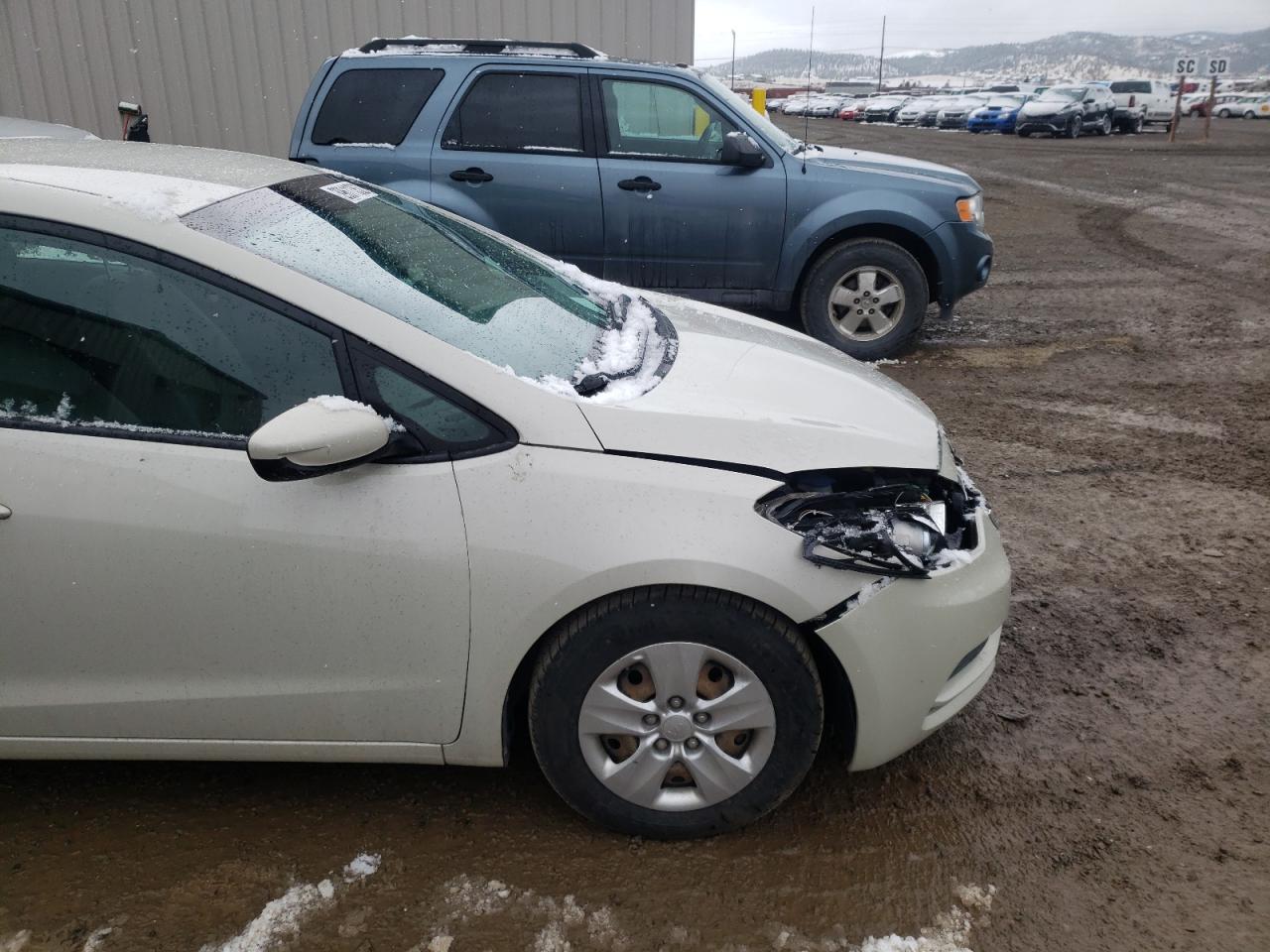Photo 9 from auction – 2015 KIA FORTE LX with VIN KNAFK4A69F5280041
