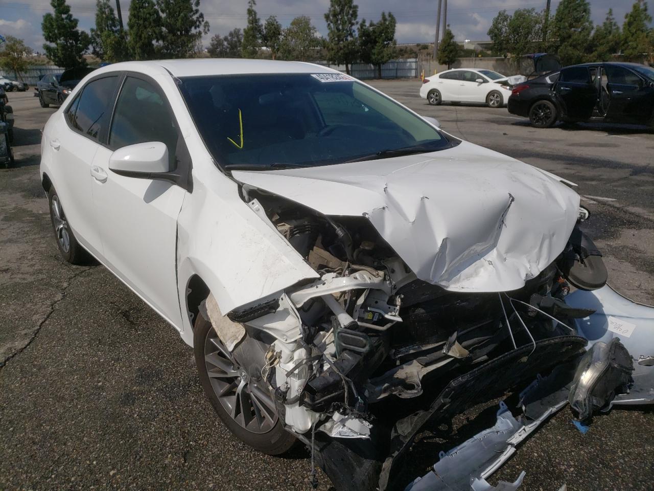 TOYOTA COROLLA L 2016 with VIN 5YFBURHE0GP486813 - Photo from auction