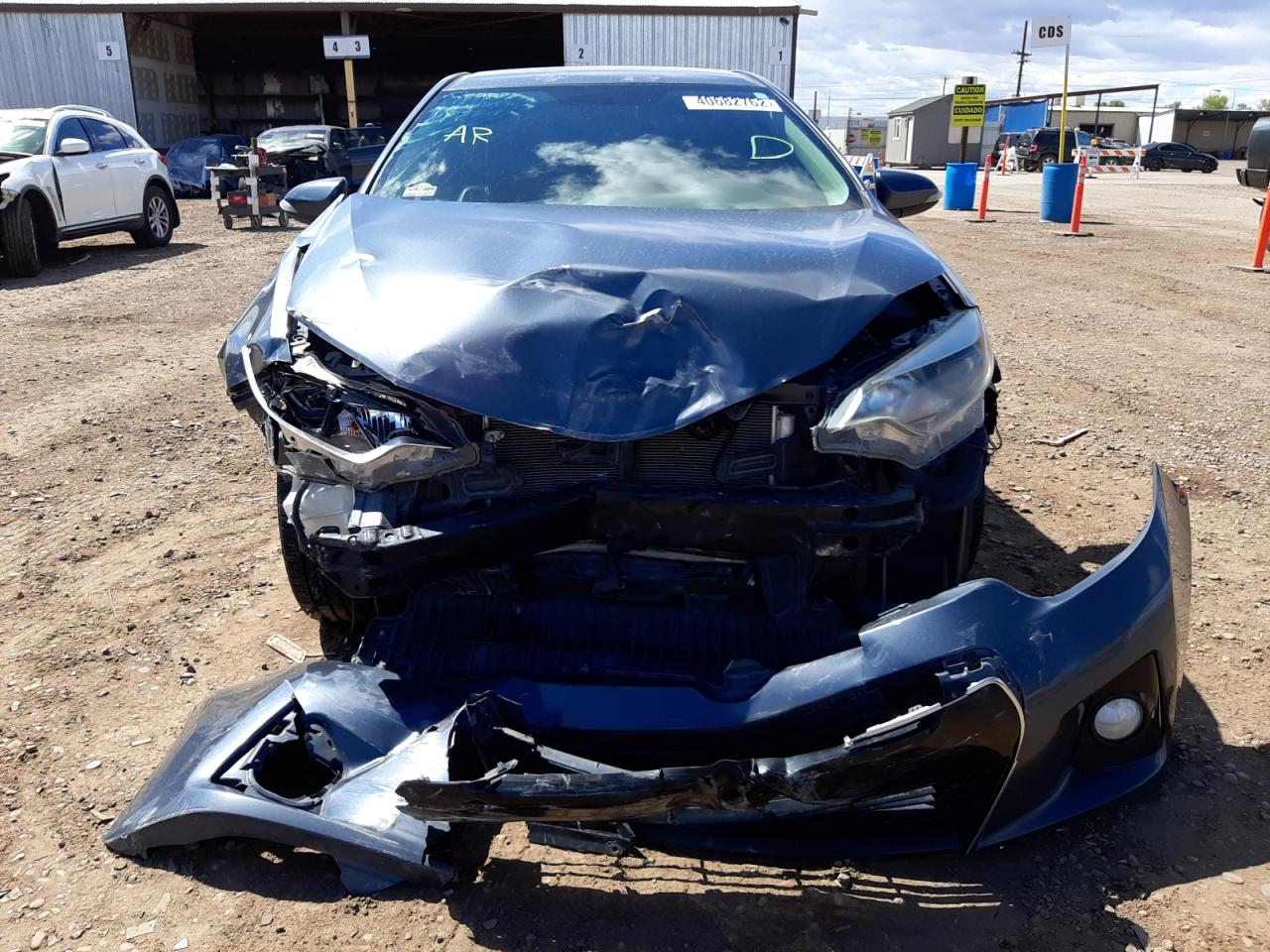 Photo 9 from auction – 2014 TOYOTA COROLLA L with VIN 5YFBURHE6EP107732