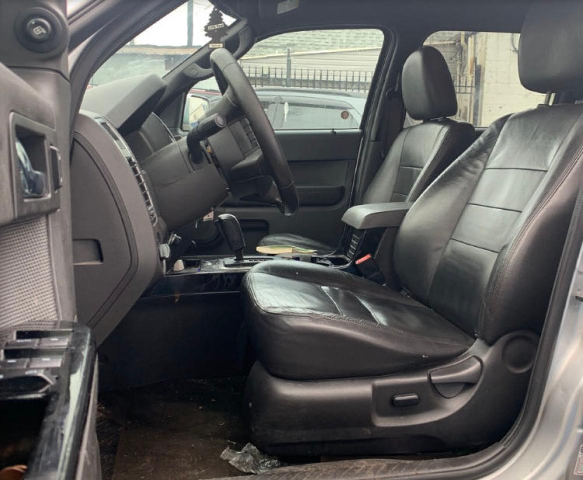 Photo 5 from auction – 2010 FORD ESCAPE LIM with VIN 1FMCU9EG8AKA68611