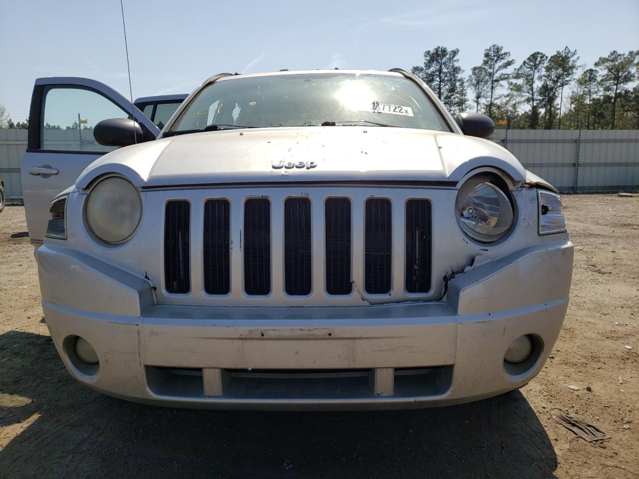 Photo 9 from auction – 2010 JEEP COMPASS SP with VIN 1J4NF4FB1AD593456