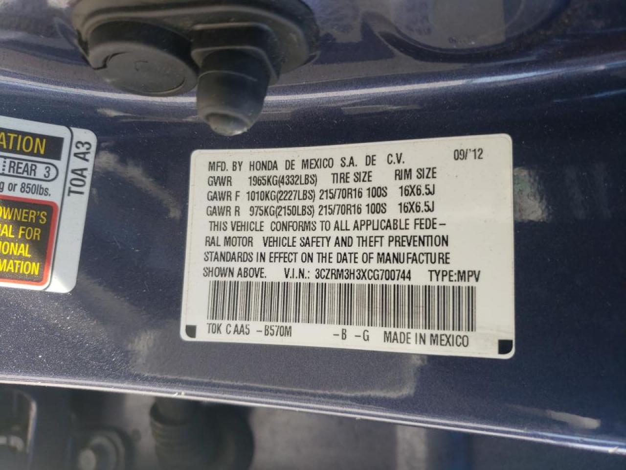 Photo 10 from auction – 2012 HONDA CR-V LX with VIN 3CZRM3H3XCG700744
