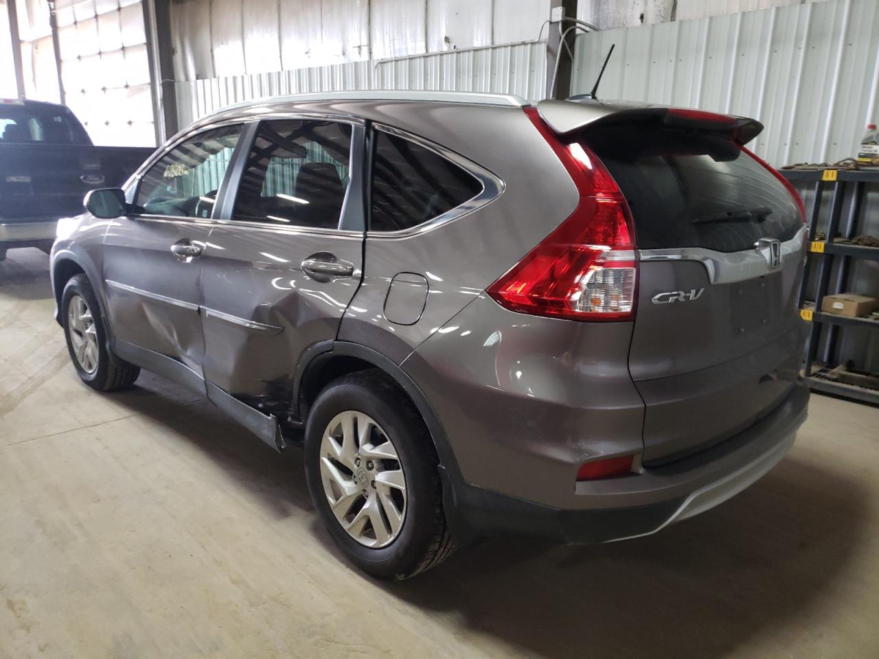Photo 3 from auction – 2015 HONDA CR-V EXL with VIN 5J6RM4H77FL051971