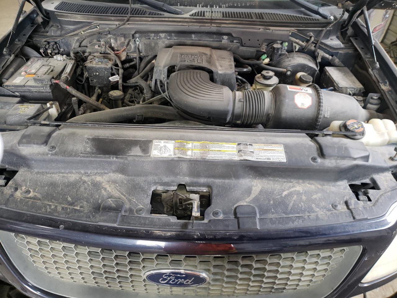 Photo 7 from auction – 2001 FORD F150 SUPER with VIN 1FTRW08L01KE61984