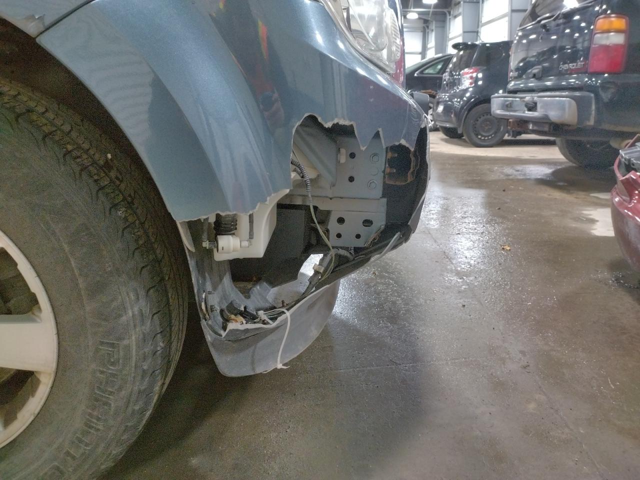 Photo 9 from auction – 2011 FORD ESCAPE LIM with VIN 1FMCU9EG7BKA38467