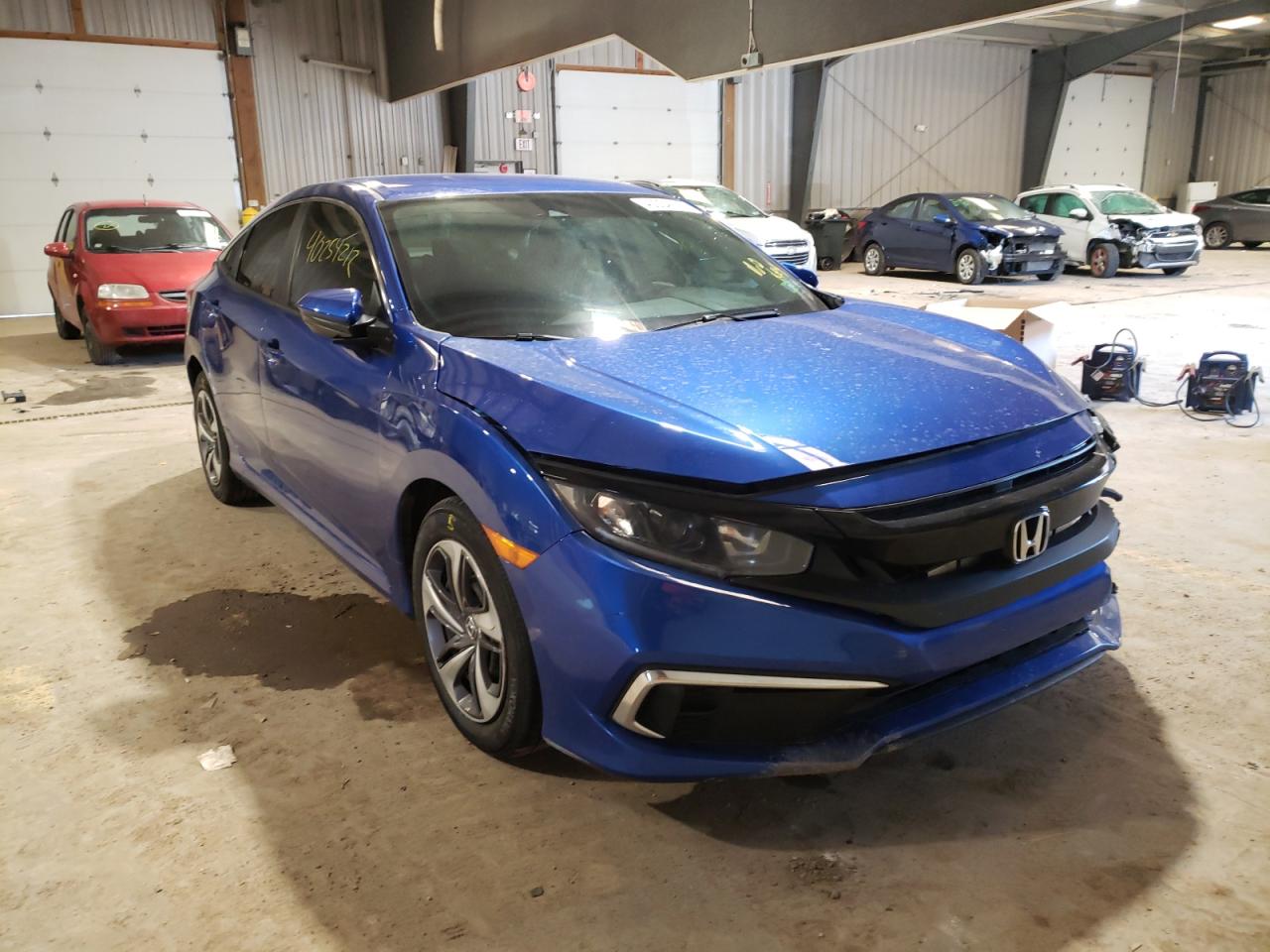 HONDA CIVIC LX 2019 with VIN 19XFC2F62KE031253 - Photo from auction