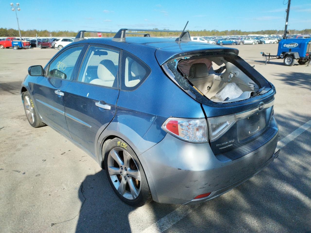 Foto 3 de la subasta – 2010 SUBARU IMPREZA OU con VIN JF1GH6D64AH800978