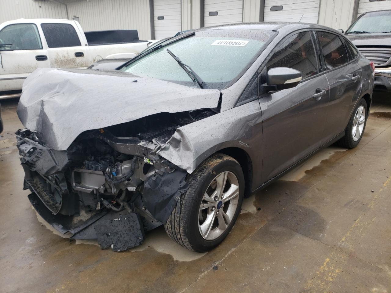 Photo 2 from auction – 2014 FORD FOCUS SE with VIN 1FADP3F2XEL148479