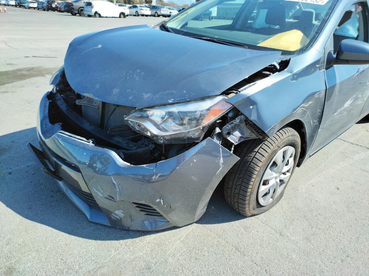 Photo 9 from auction – 2016 TOYOTA COROLLA EC with VIN 5YFBPRHE2GP470023