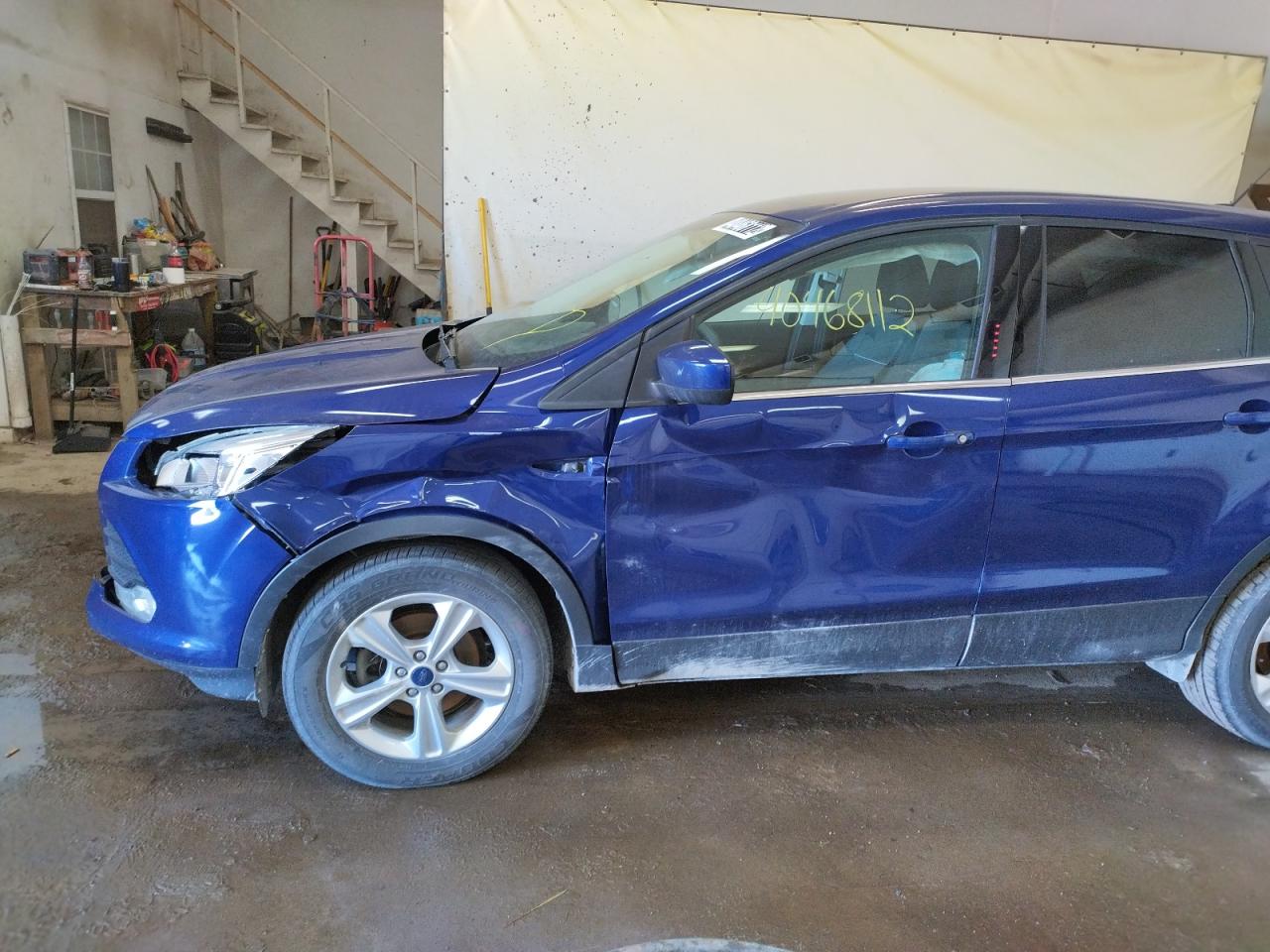 Photo 9 from auction – 2015 FORD ESCAPE SE with VIN 1FMCU0G72FUC23318