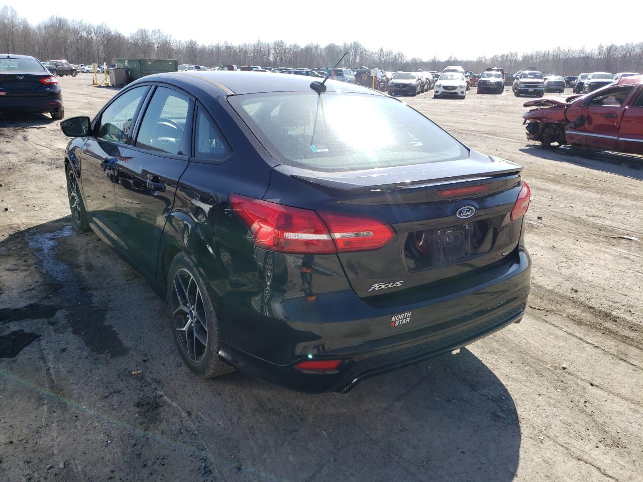 Photo 3 from auction – 2016 FORD FOCUS SE with VIN 1FADP3F27GL403253