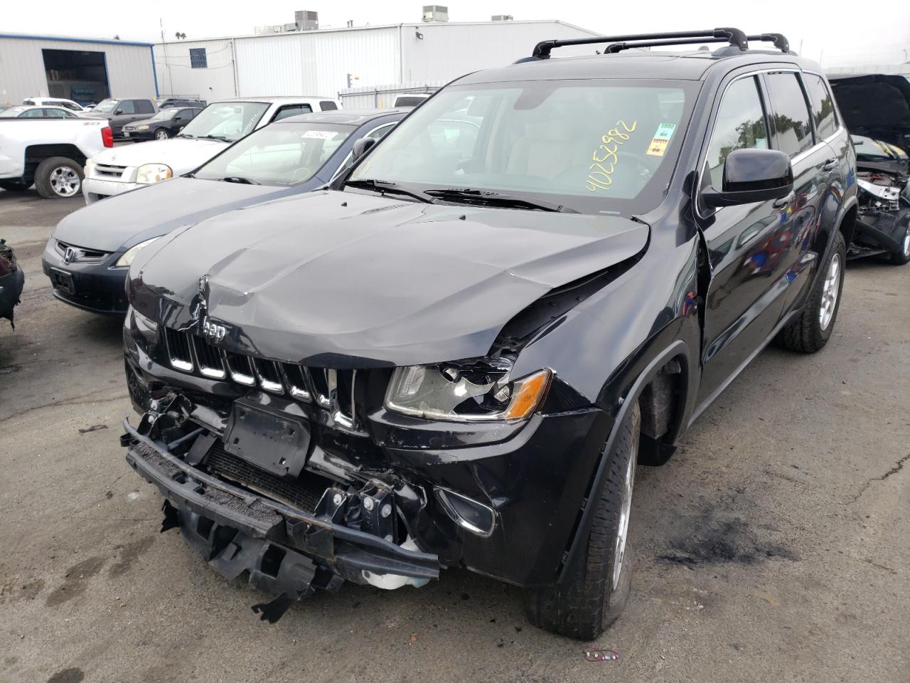 Photo 2 from auction – 2014 JEEP GRAND CHER with VIN 1C4RJFAG3EC109478