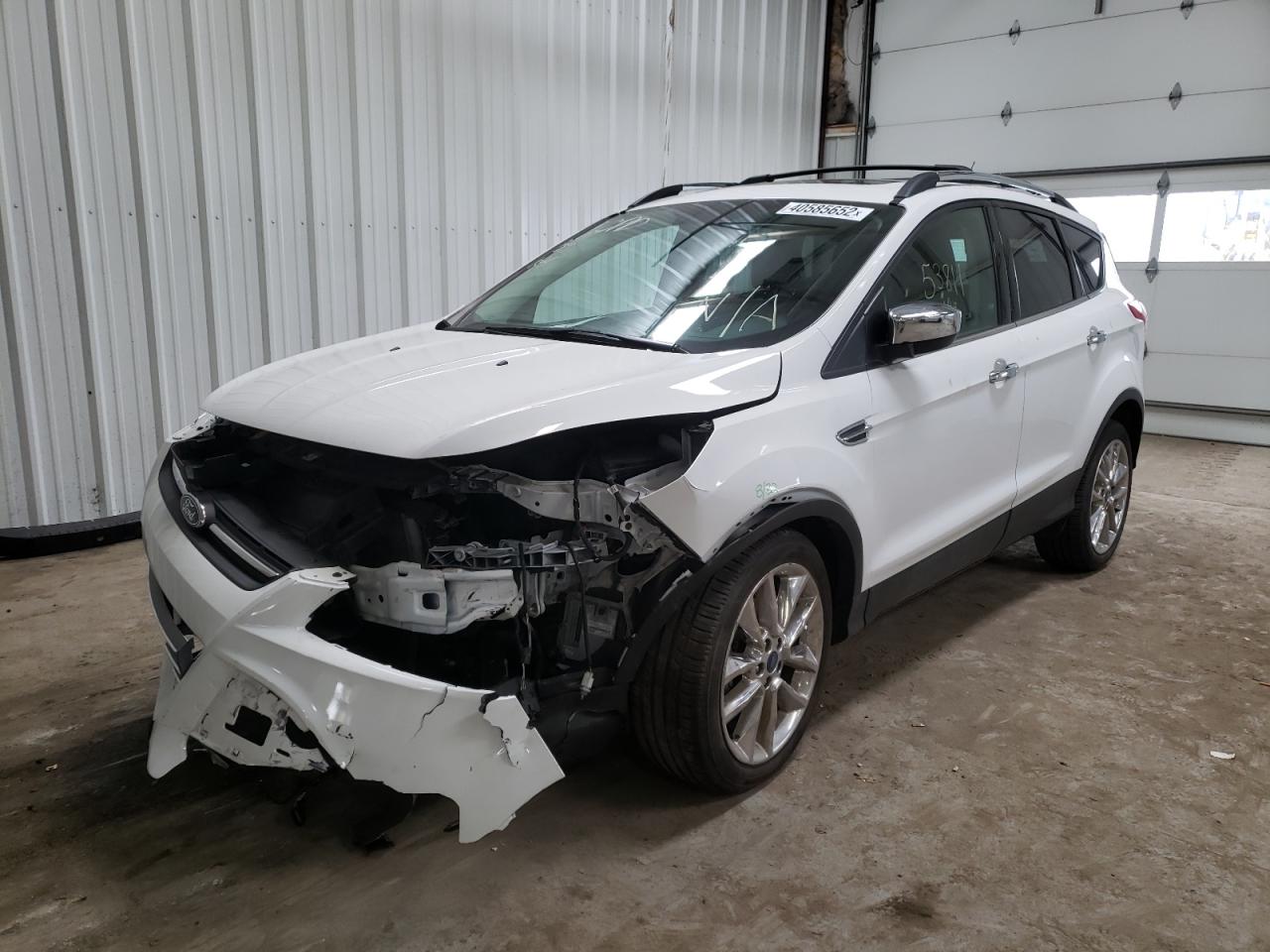 Photo 2 from auction – 2016 FORD ESCAPE SE with VIN 1FMCU0GX9GUA18497