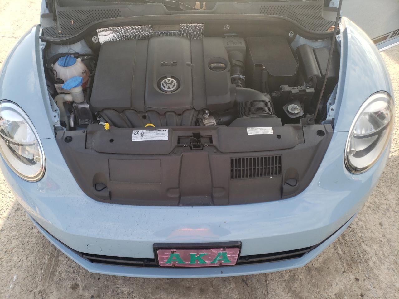 Photo 7 from auction – 2014 VOLKSWAGEN BEETLE with VIN 3VWJP7AT0EM609270