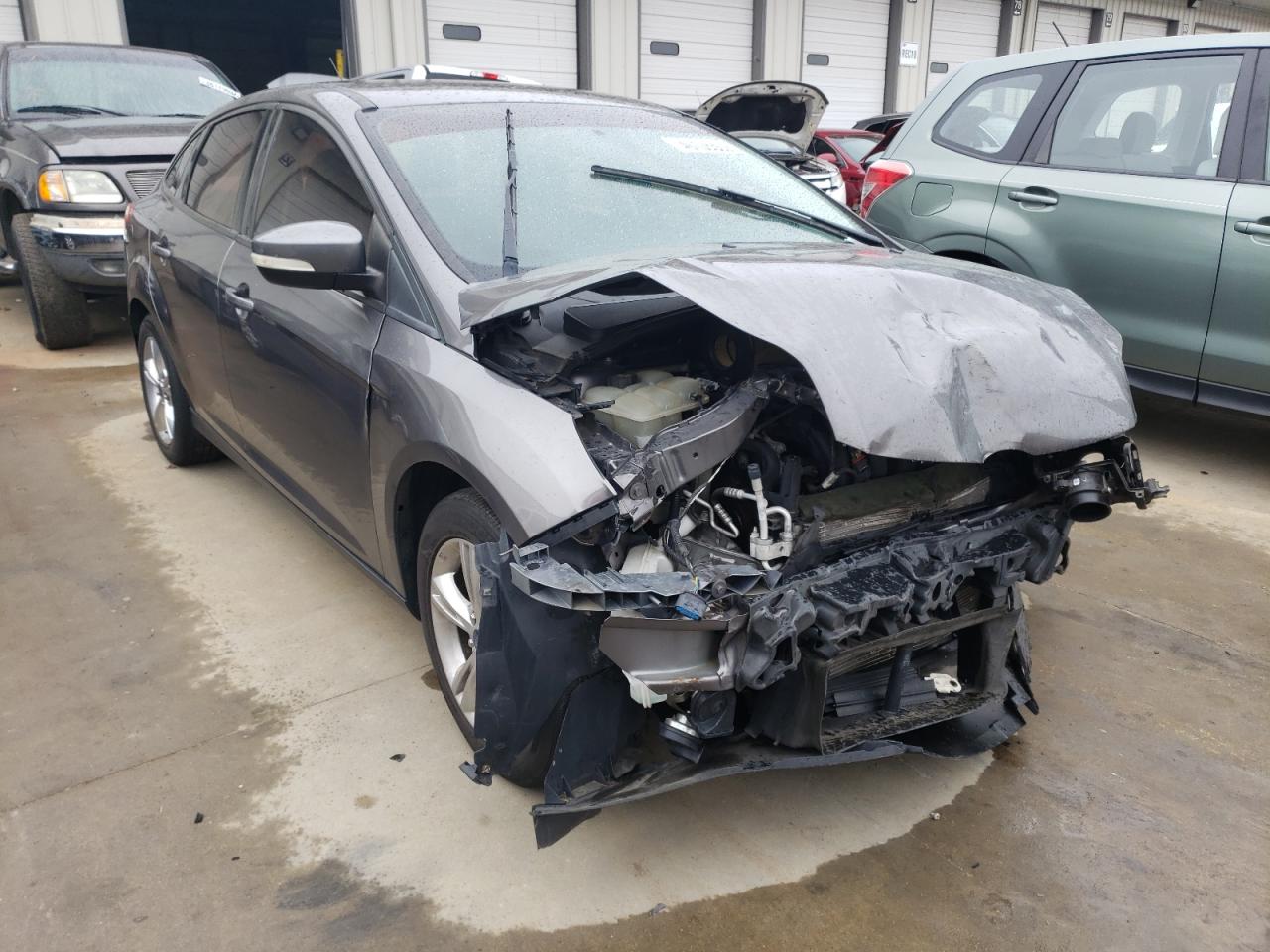 FORD FOCUS SE 2014 with VIN 1FADP3F2XEL148479 - Photo from auction