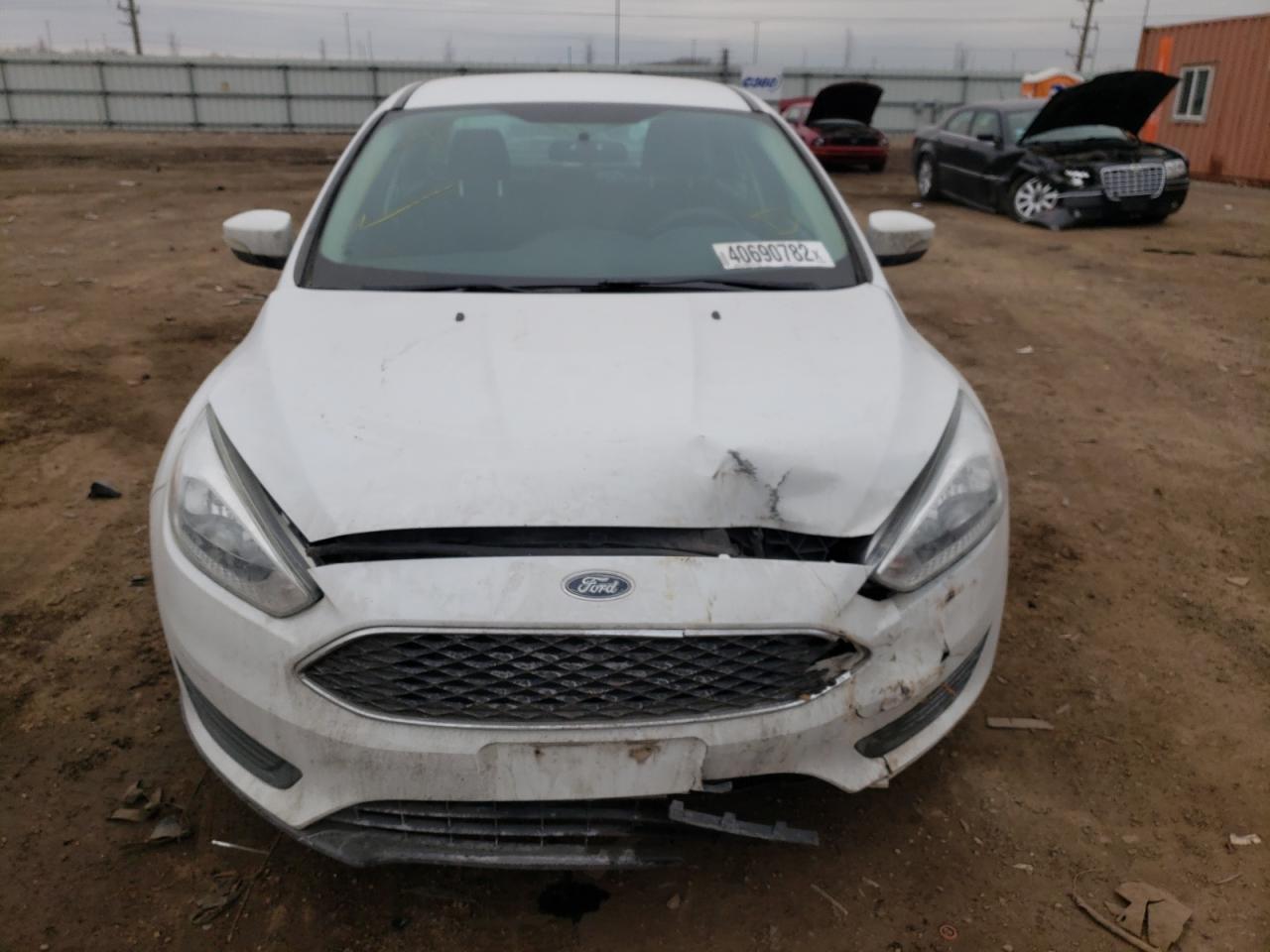 Photo 9 from auction – 2015 FORD FOCUS SE with VIN 1FADP3F2XFL312492
