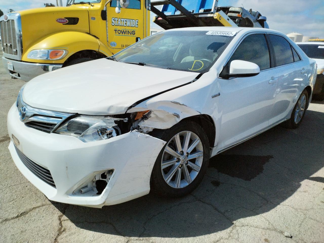Photo 2 from auction – 2012 TOYOTA CAMRY HYBR with VIN 4T1BD1FK7CU026017