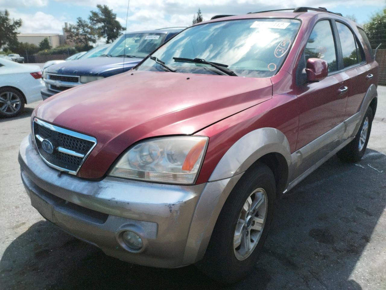 Photo 2 from auction – 2003 KIA SORENTO EX with VIN KNDJC733635057420