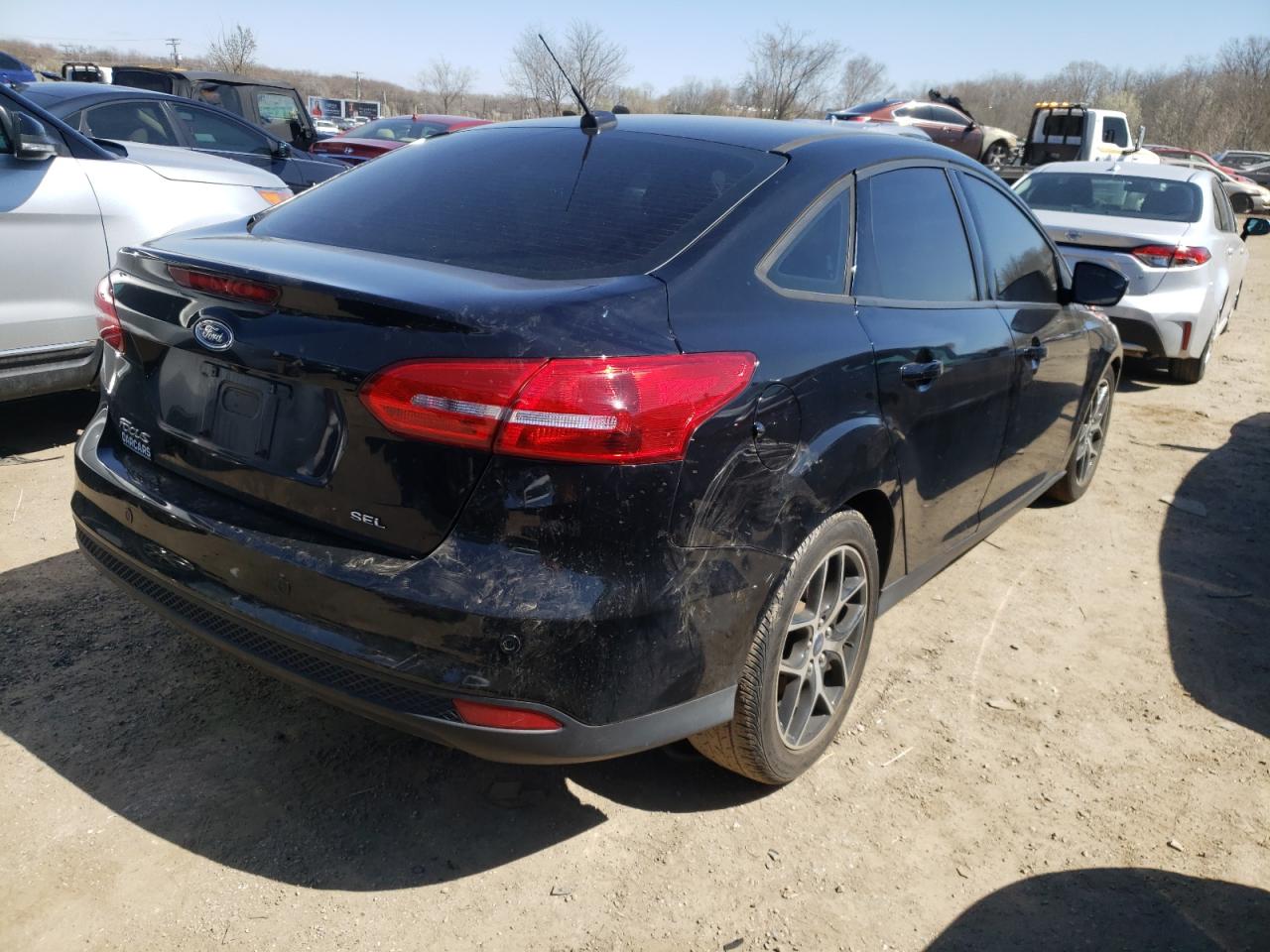 Photo 4 from auction – 2017 FORD FOCUS SEL with VIN 1FADP3H26HL234776