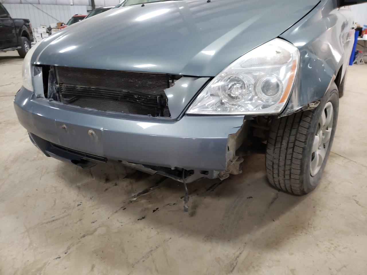 Photo 9 from auction – 2006 KIA SEDONA EX with VIN KNDMB233266074393