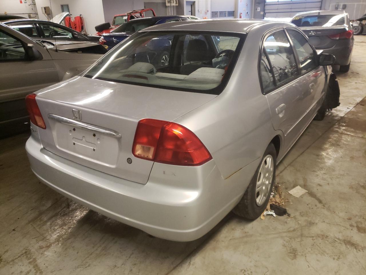 Photo 4 from auction – 2002 HONDA CIVIC LX with VIN 1HGES15522L024944