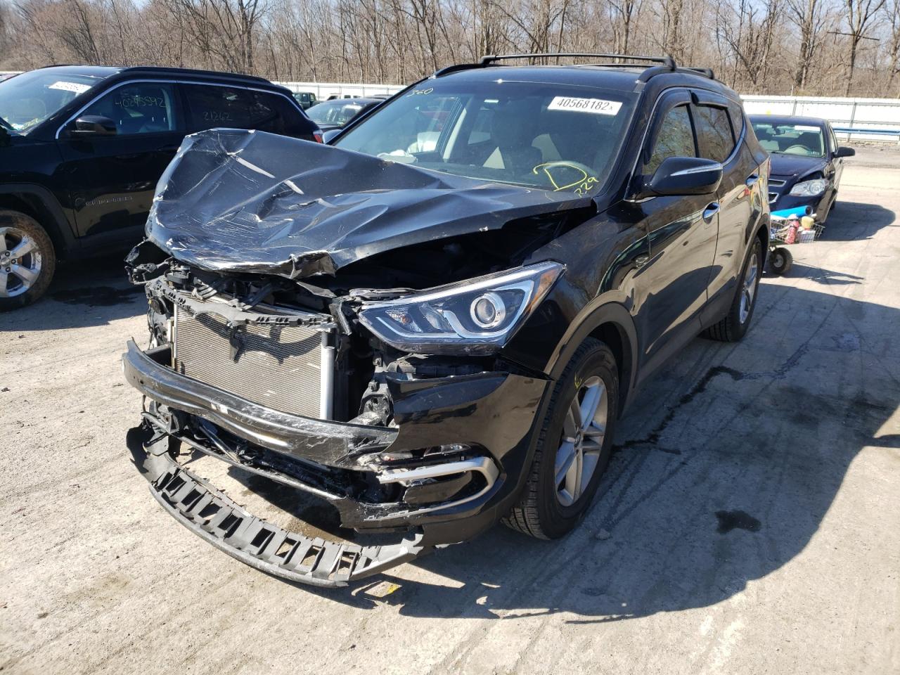 Photo 12 from auction – 2017 HYUNDAI SANTA FE S with VIN 5NMZU3LB7HH049461