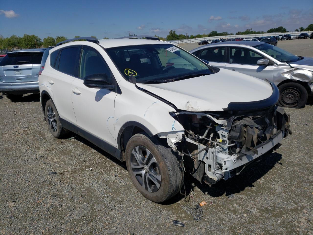 TOYOTA RAV4 LE 2018 with VIN JTMBFREV2JJ203791 - Photo from auction