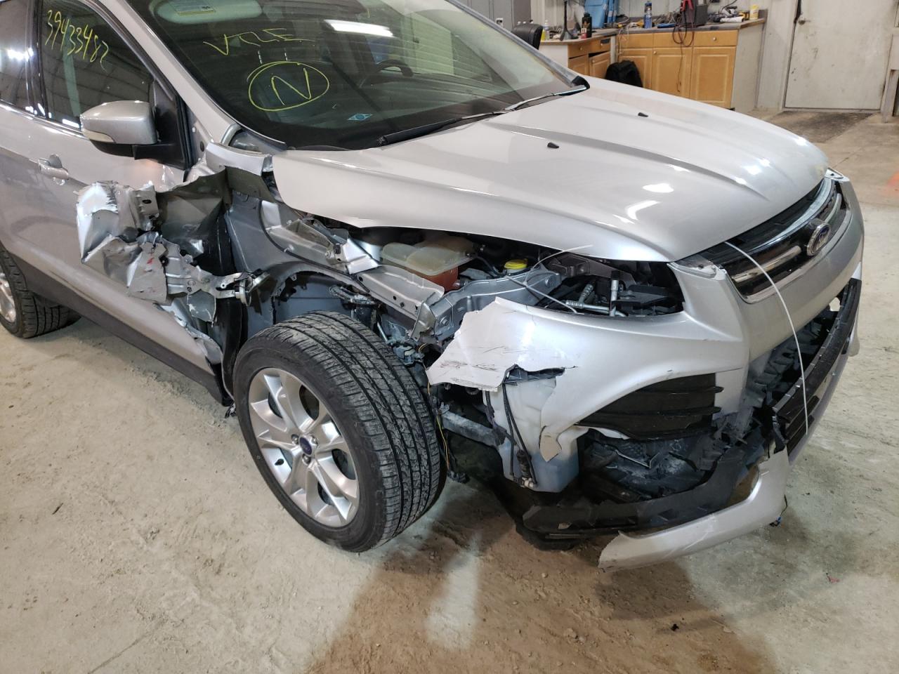 Photo 9 from auction – 2014 FORD ESCAPE TIT with VIN 1FMCU0JX0EUA99833