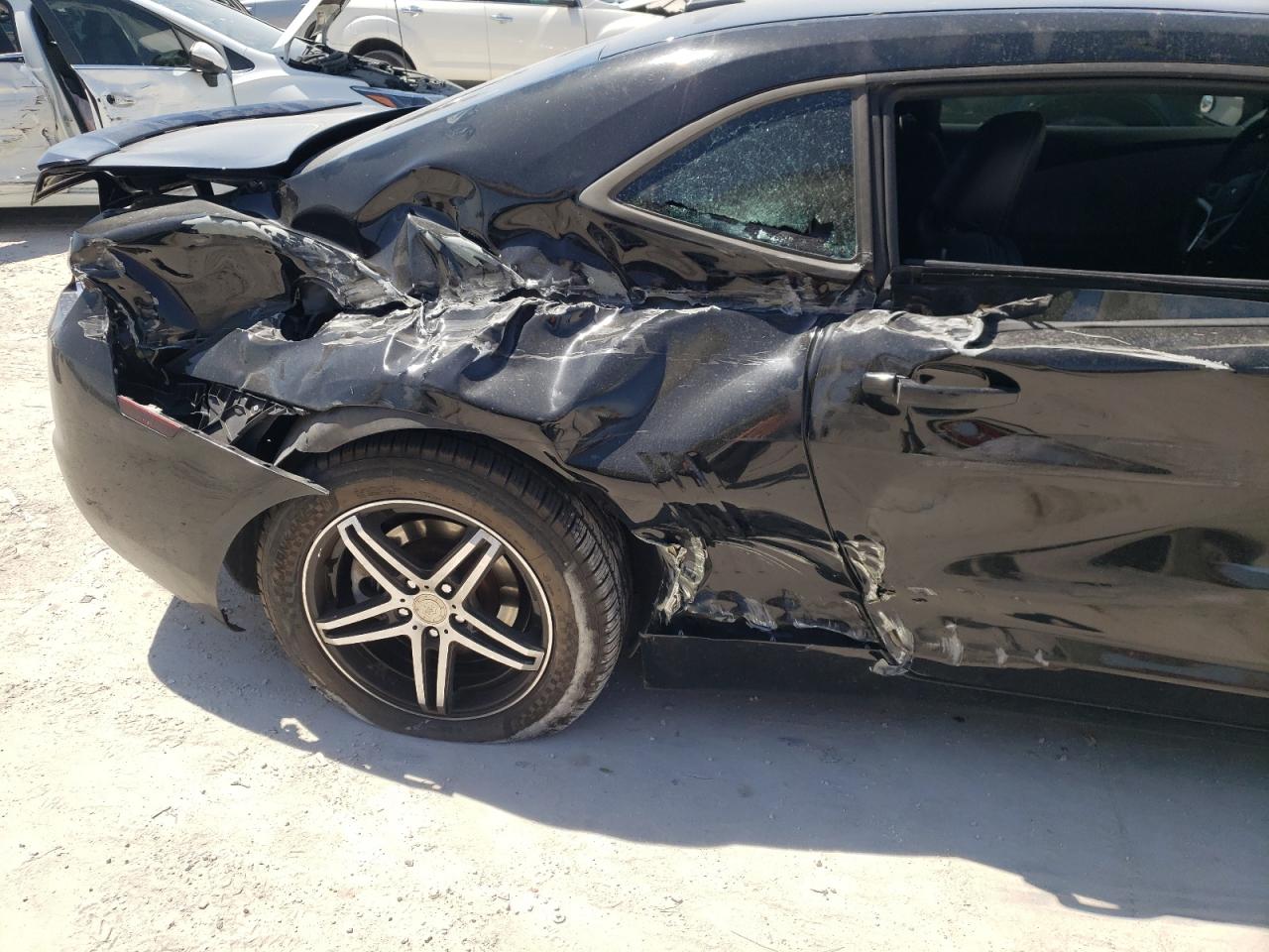 Photo 9 from auction – 2013 CHEVROLET CAMARO LS with VIN 2G1FA1E3XD9138701