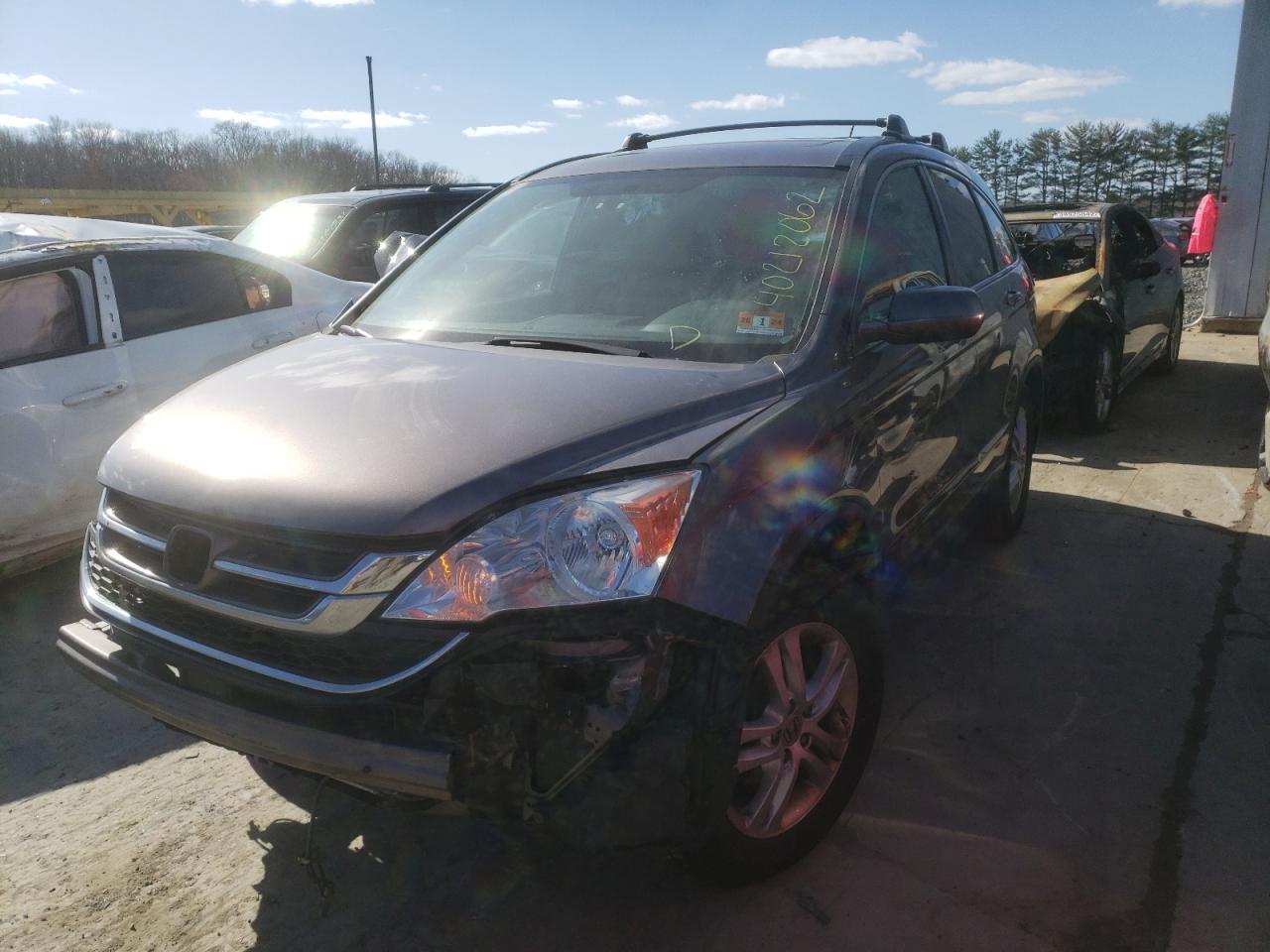 Photo 2 from auction – 2011 HONDA CR-V EXL with VIN 5J6RE4H70BL034288