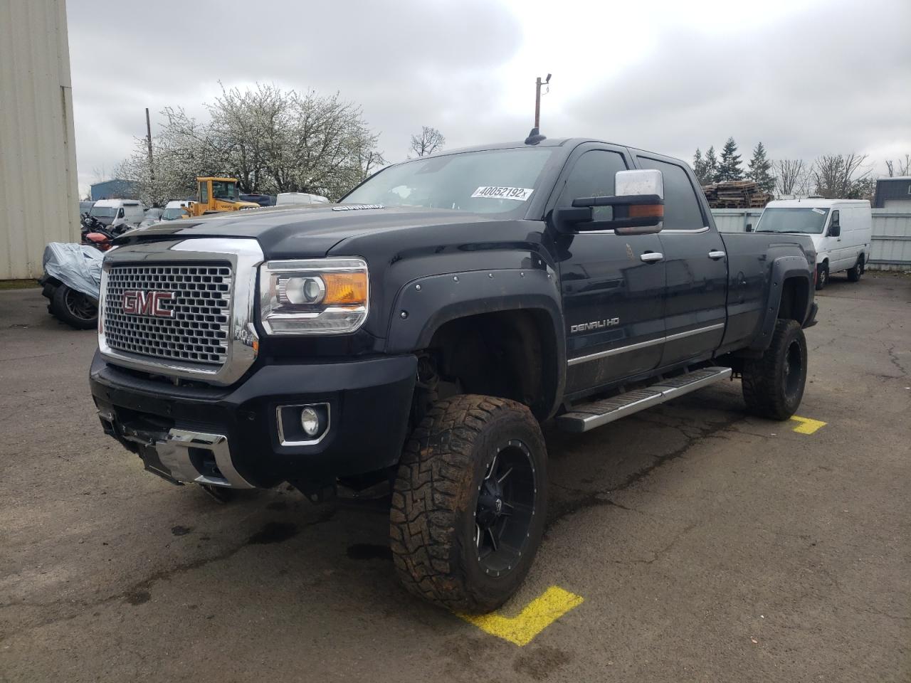 Photo 2 from auction – 2016 GMC SIERRA K35 with VIN 1GT42YE8XGF112417