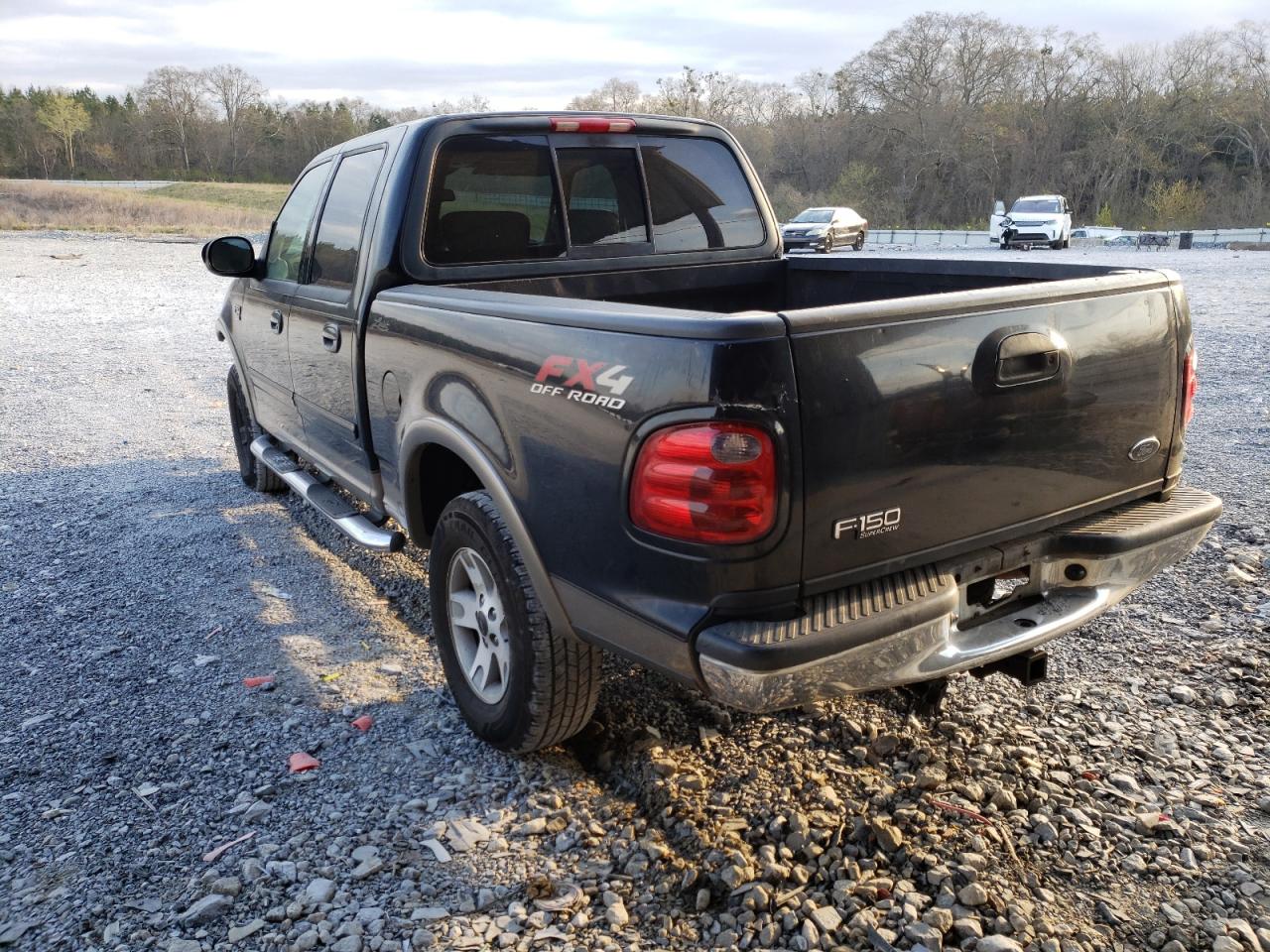 Photo 3 from auction – 2003 FORD F150 SUPER with VIN 1FTRW08L43KD73068