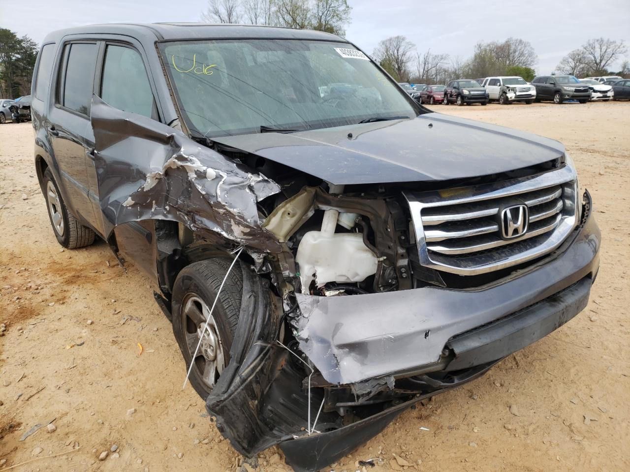 HONDA PILOT LX 2014 with VIN 5FNYF3H25EB022562 - Photo from auction