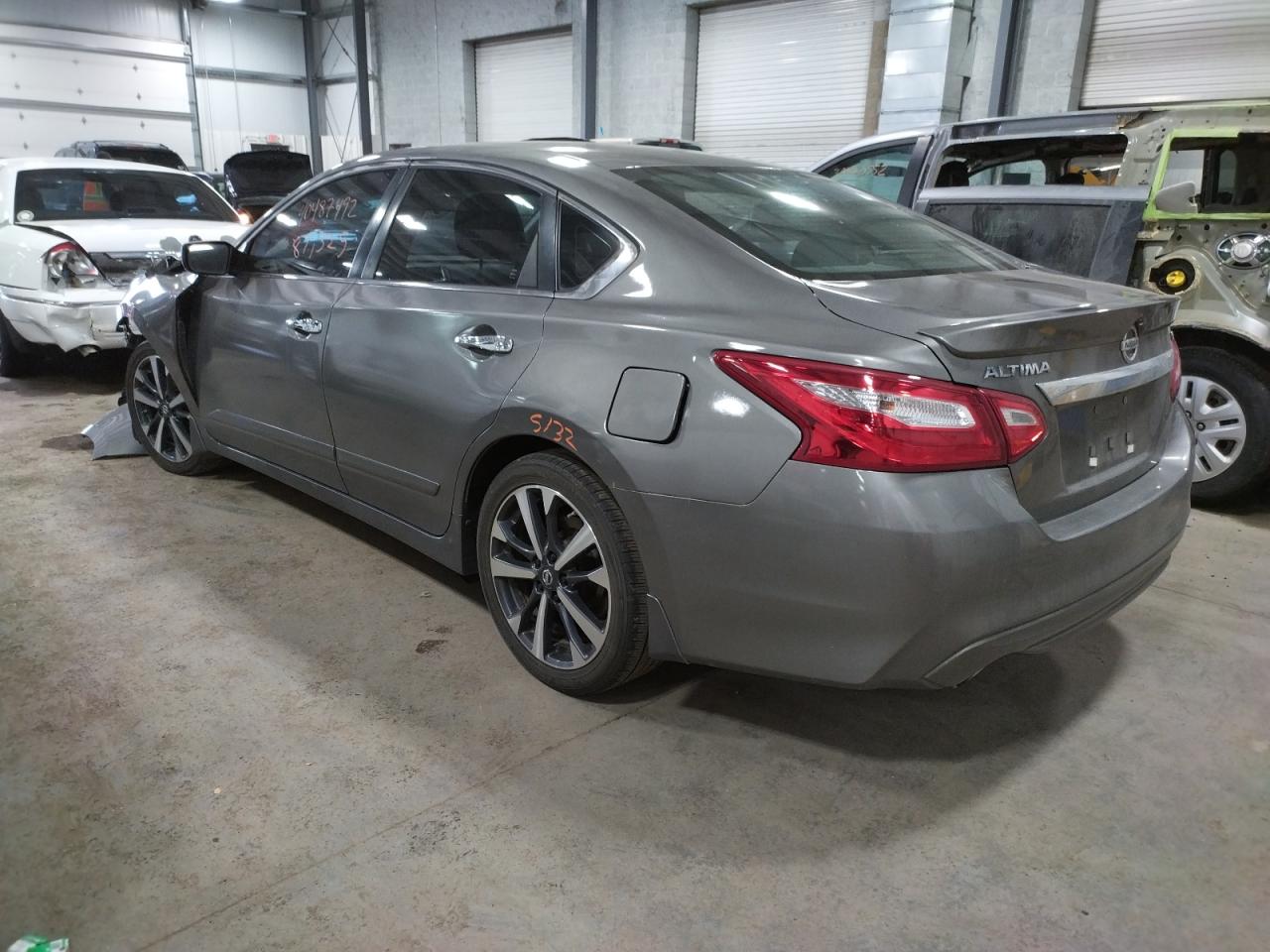 Photo 3 from auction – 2016 NISSAN ALTIMA 2.5 with VIN 1N4AL3AP5GC204140